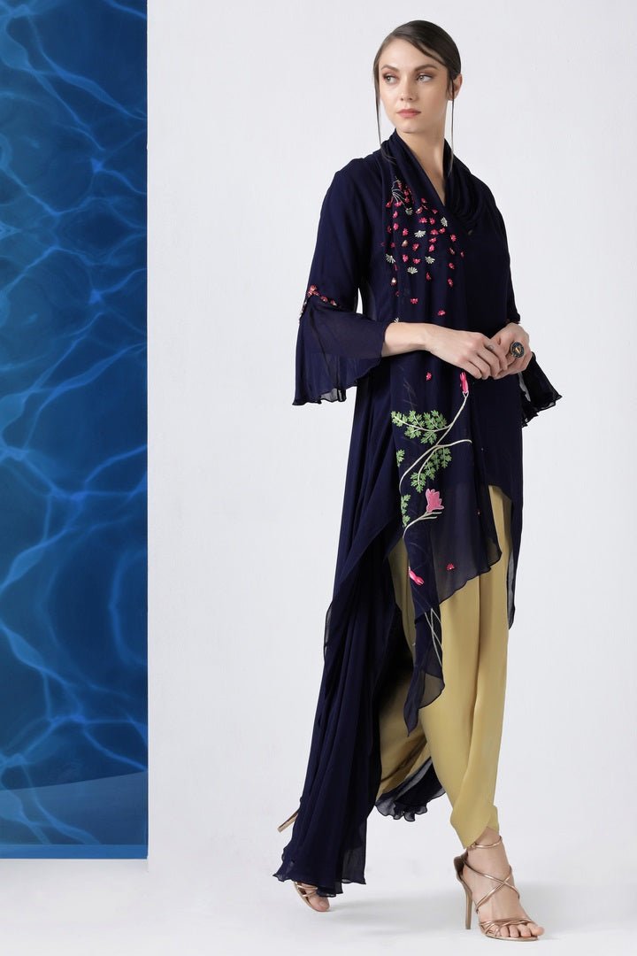 Shop navy embroidered hi-low tunic with dhoti pants online in USA from Pure Elegance. Make your wardrobe an eclectic mix of alluring silhouettes and colors with a range of Indian designer clothes available at our clothing store in USA. -side