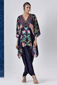 Shop navy printed kaftaan style tunic with dhoti pants online in USA from Pure Elegance. Make your wardrobe an eclectic mix of alluring silhouettes and colors with a range of Indian designer clothes available at our clothing store in USA.-front 