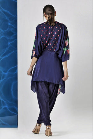 Shop navy printed kaftaan style tunic with dhoti pants online in USA from Pure Elegance. Make your wardrobe an eclectic mix of alluring silhouettes and colors with a range of Indian designer clothes available at our clothing store in USA. -side