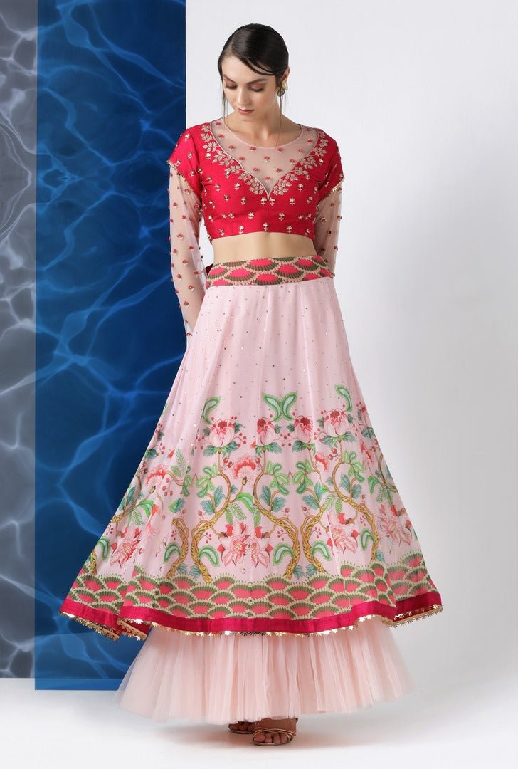 Shop red and pink embroidered and printed skirt set online in USA at Pure Elegance. Make your wardrobe an eclectic mix of alluring silhouettes and colors with a range of Indian designer clothing available at our clothing store in USA. -full view