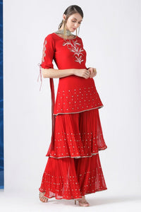 Buy red embroidered kurta with layered kurta with pleated dupatta online in USA from Pure Elegance. Make your wardrobe an eclectic mix of alluring silhouettes and colors with a range of Indian designer clothes available at our clothing store in USA. -full view