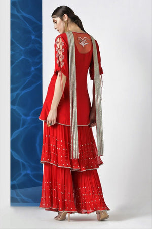 Buy red embroidered kurta with layered kurta with pleated dupatta online in USA from Pure Elegance. Make your wardrobe an eclectic mix of alluring silhouettes and colors with a range of Indian designer clothes available at our clothing store in USA. -back