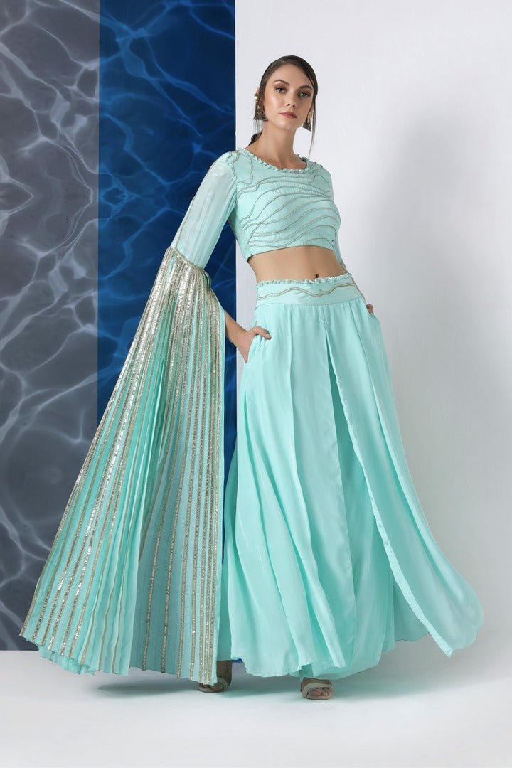 Buy mint embroidered crop top with exaggerated sleeves and palazzo online in USA at Pure Elegance. Make your wardrobe an eclectic mix of alluring silhouettes and colors with a range of Indian designer clothes available at our clothing store in USA. -full view