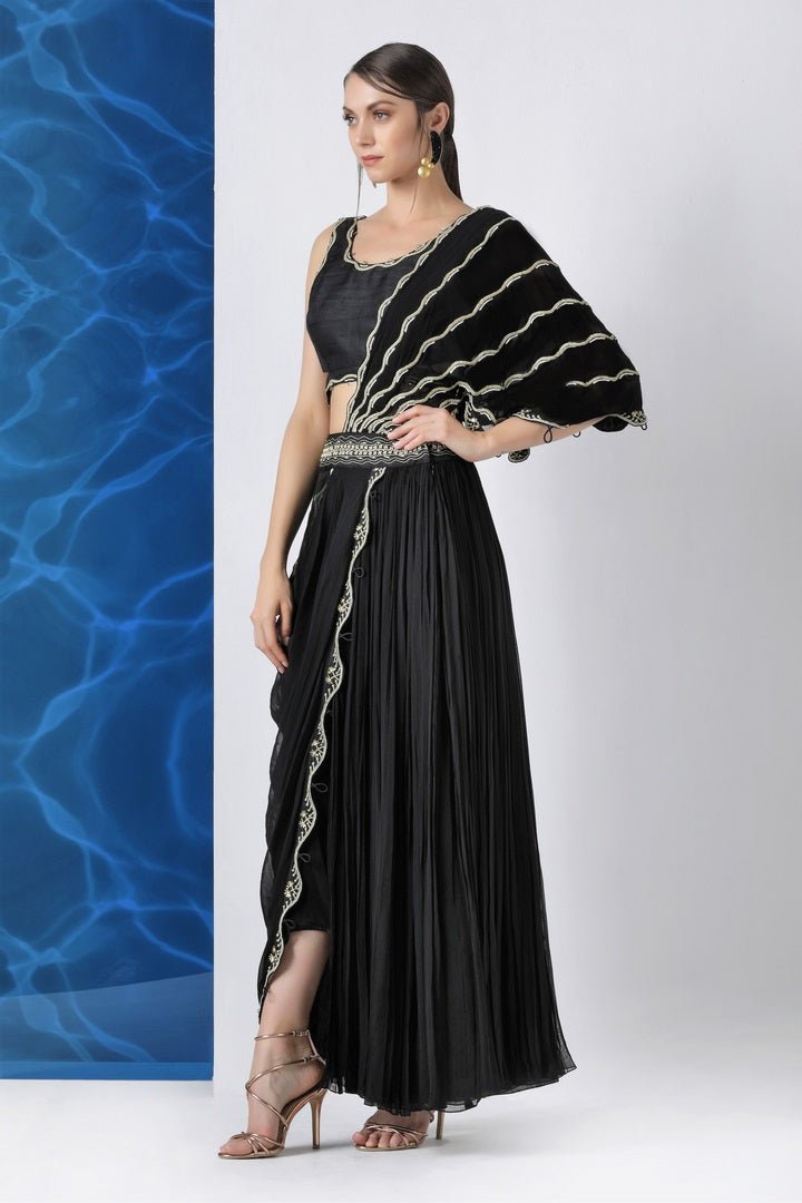 Buy black embroidered crop top and skirt with draped dupatta online in USA from Pure Elegance. Make your wardrobe an eclectic mix of alluring silhouettes and colors with a range of Indian designer clothing available at our clothing store in USA. -side