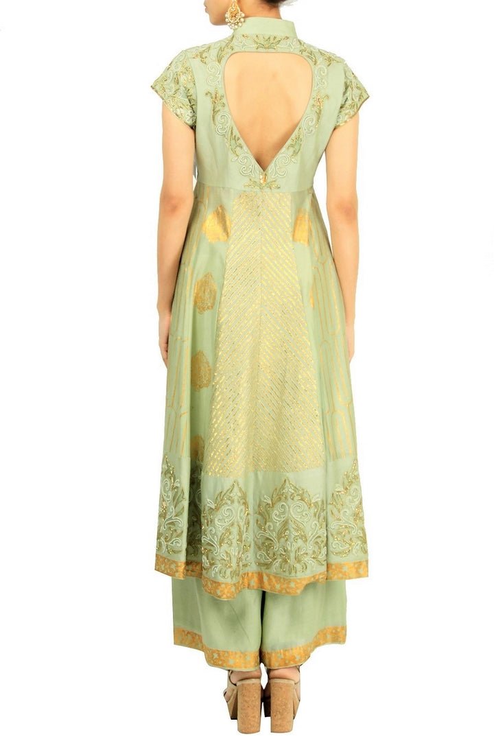 Mint green chanderi silk suit with palazzo pants for online shopping in USA. Make your ethnic wardrobe complete with an exquisite collection of Indian designer clothing from Pure Elegance clothing store in USA. A splendid variety of designer dresses, designer lehenga choli, salwar suits will leave you wanting for more. Shop now.-back