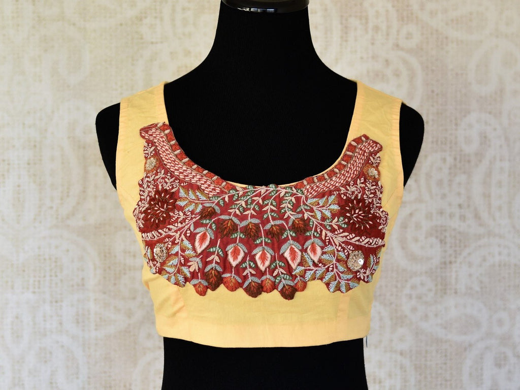 Buy lemon yellow embroidered sleeveless cotton saree blouse online in USA. Elevate your traditional Indian sarees with matching and contrasting designer sari blouses from Pure Elegance Indian clothing store in USA.-front