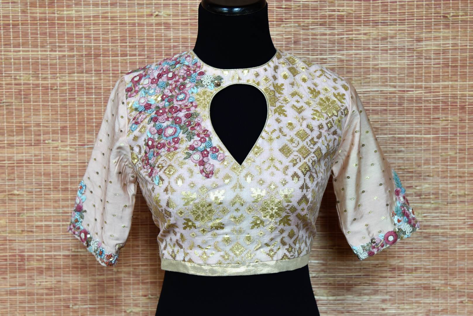 Shop cream embroidered Banarasi saree blouse online in USA. Elevate your ethnic saree style with a tasteful collection of designer saree blouses from Pure Elegance Indian clothing store in USA.-front