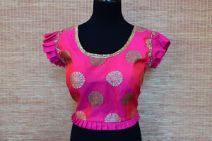 Shop pink embroidered Banarasi saree blouse online in USA with frill sleeves. Elevate your ethnic saree style with a tasteful collection of designer saree blouses from Pure Elegance Indian clothing store in USA.-front