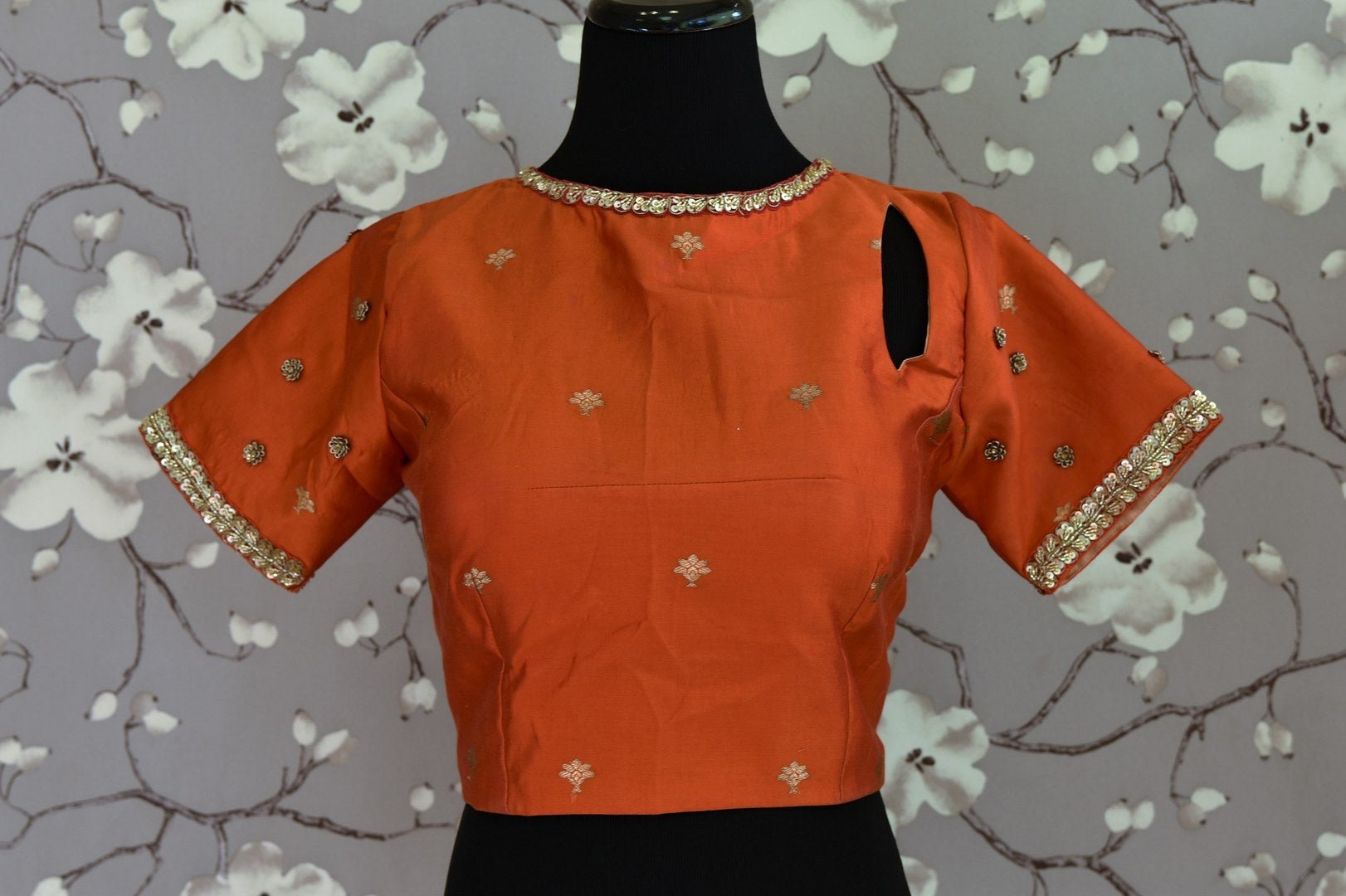 Shop rust orange embroidered Banarasi saree blouse online in USA. Score a perfect ten for your saree look with exquisite designer saree blouses from Pure Elegance Indian fashion store in USA. Shop now.-front