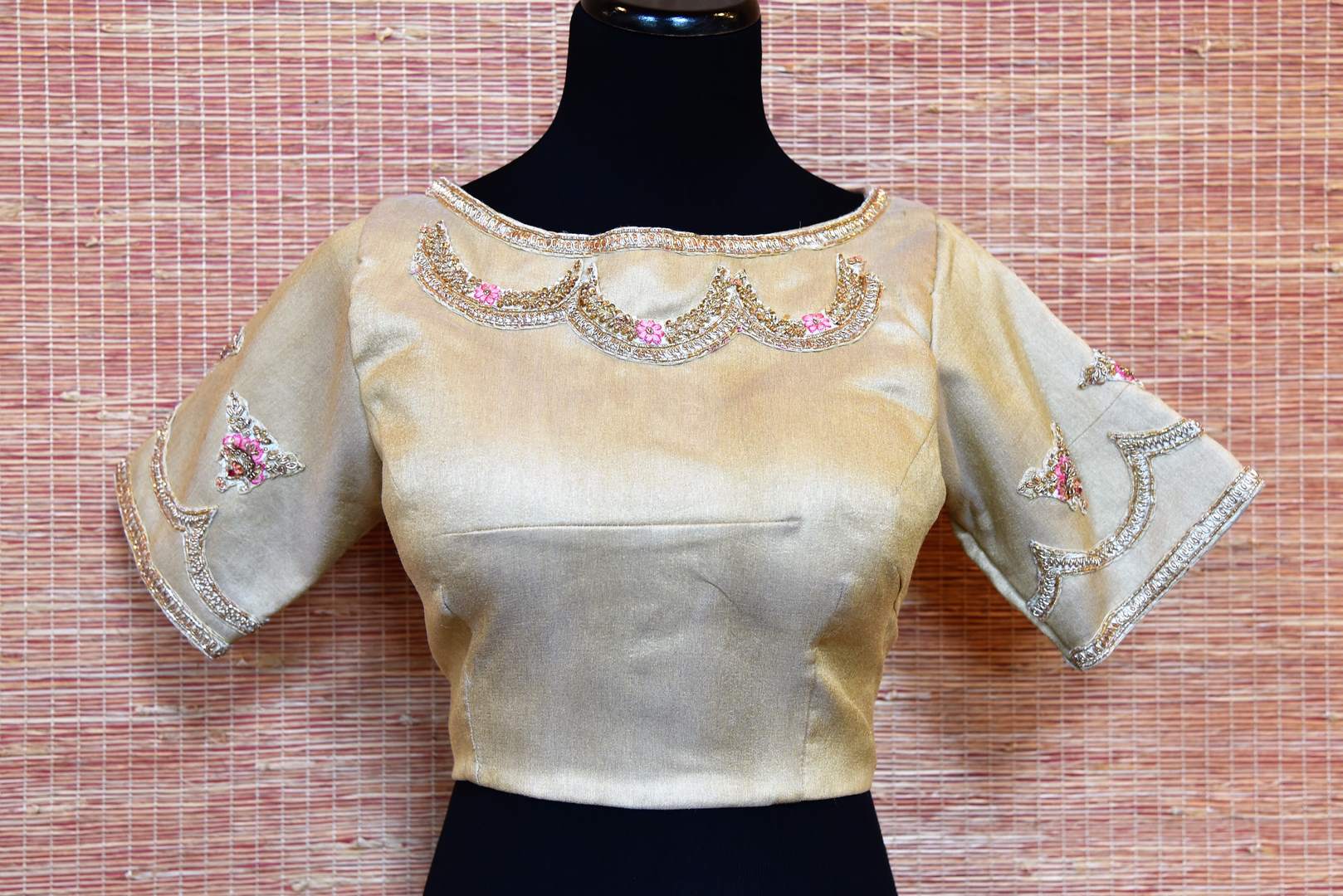 Shop gorgeous cream raw silk embroidered designer saree blouse online in USA. Stand amongst the crowd with your tasteful ethnic style by pairing your elegant sarees with designer saree blouses from Pure Elegance Indian fashion store for women in USA.-front