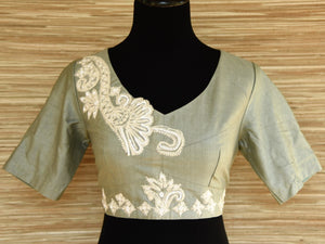 Shop grey embroidered silk saree blouse online in USA with cutout back. Enhance your Indian sarees with matching and contrasting designer saree blouses from Pure Elegance Indian fashion store in USA.-full view