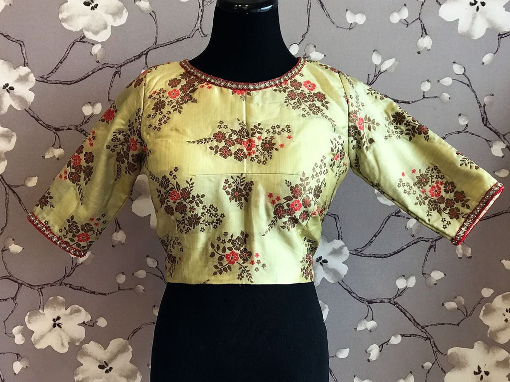 Shop lemon yellow Banarasi embroidered saree blouse online in USA. Enhance your traditional saree look with a splendid range of designer sari blouses from Pure Elegance Indian fashion store in USA.-front