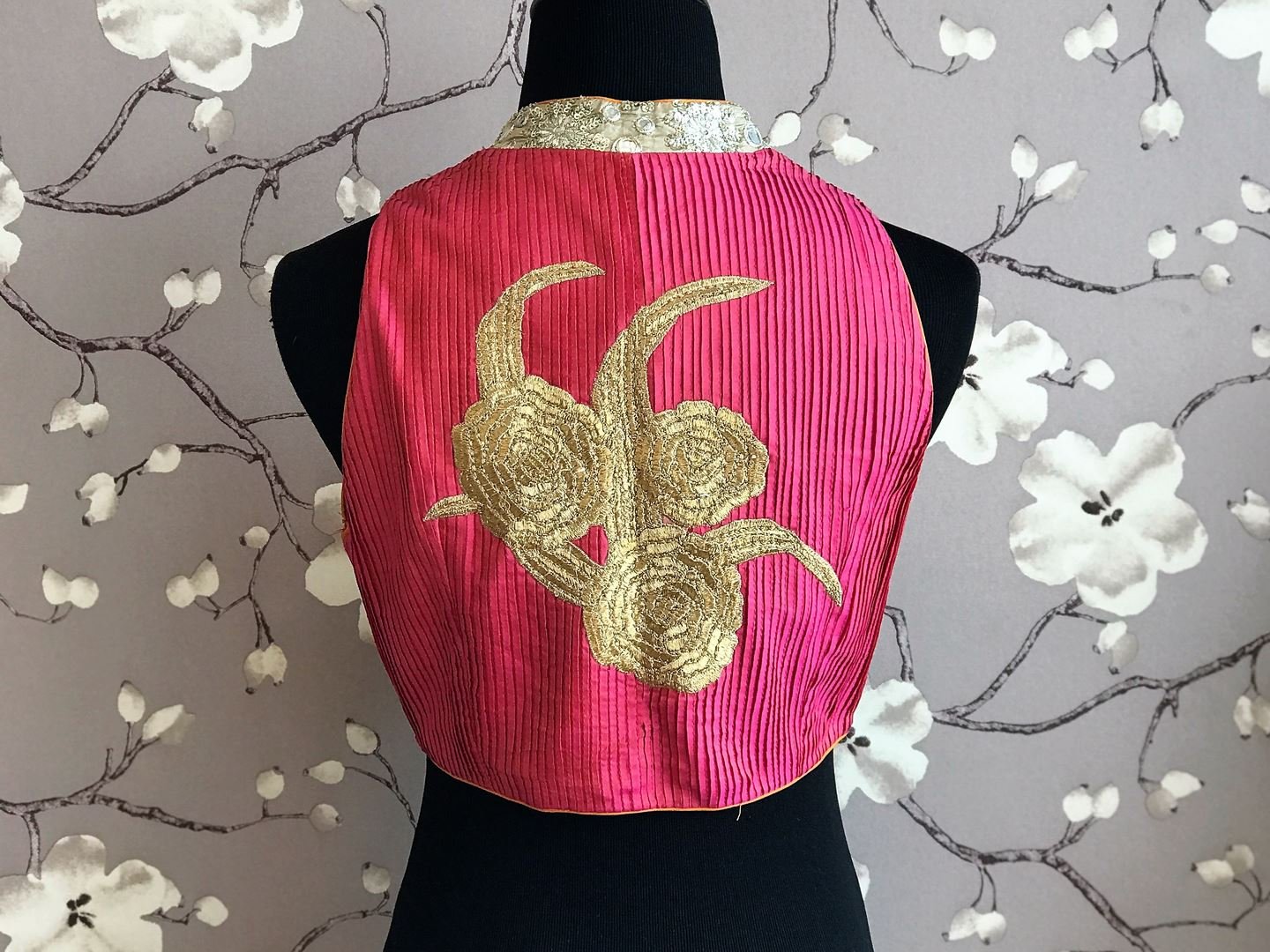 Buy golden silk embroidered saree blouse online in USA with pink back. Enhance your traditional saree look with a splendid range of designer sari blouses from Pure Elegance Indian fashion store in USA.-back