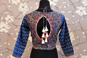 Shop blue block printed and embroidered saree blouse online in USA. Enhance your traditional saree look with a splendid range of designer saree blouses from Pure Elegance Indian fashion store in USA.-back