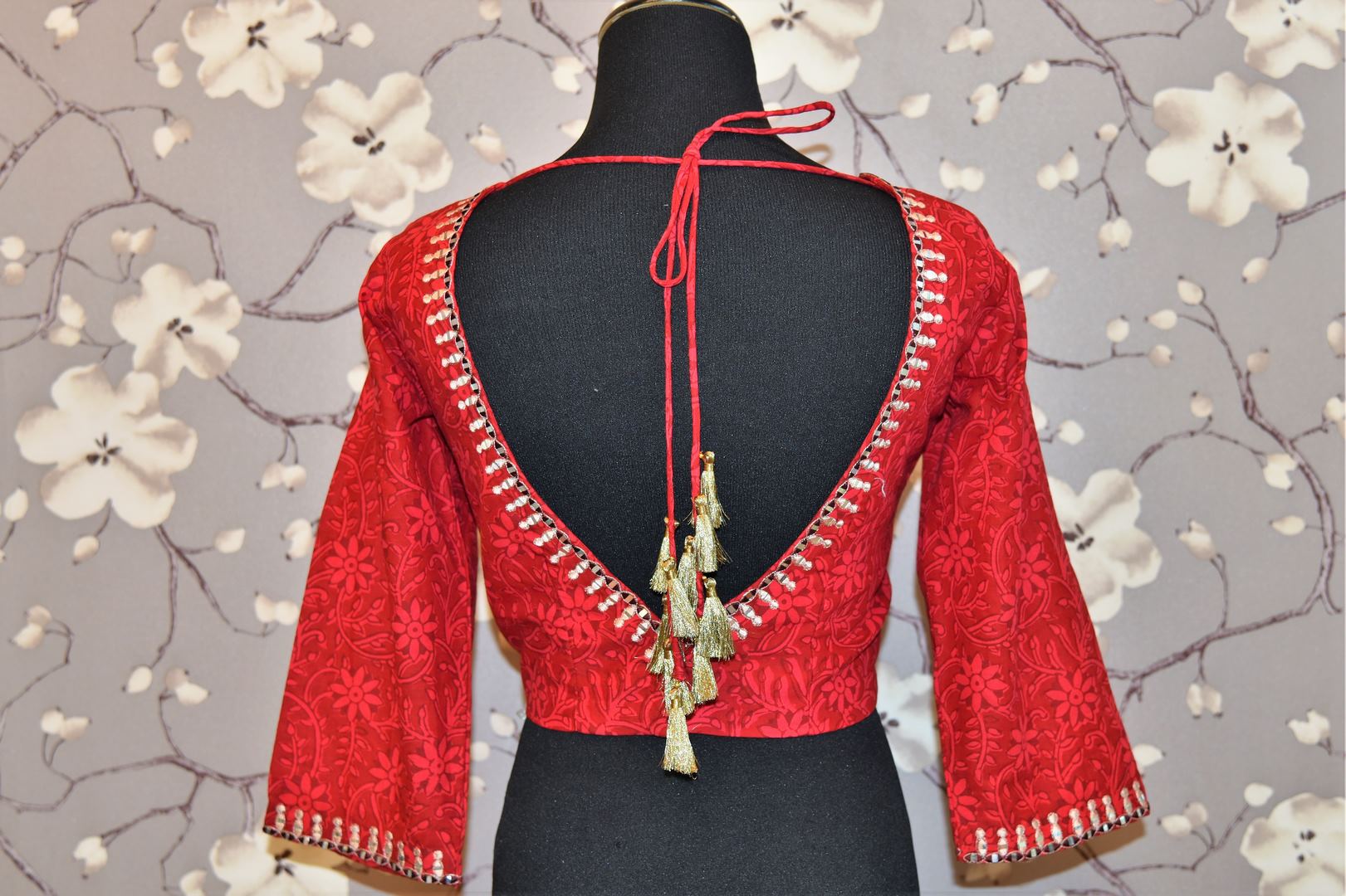 Buy red block print and embroidered saree blouse online in USA. Enhance your traditional saree look with a splendid range of designer saree blouses from Pure Elegance Indian fashion store in USA.-back