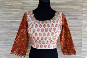Buy cream block print embroidered saree blouse online in USA with brown sleeves. Go for a striking ethnic sari style with beautiful designer saree blouses from Pure Elegance Indian fashion store in USA.-front