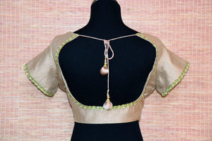 Shop elegant beige embroidered silk saree blouse online in USA. Match your sarees with exquisite Indian saree blouses from Pure Elegance Indian fashion store in USA.-back
