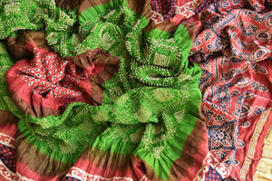 Shop beautiful light greena and peach bandhej gajji silk dupatta online in USA with Ajrakh print. Choose from an exclusive collection of Indian designer suits, Anarakali dresses, palazzo suits, salwar suits, designer gowns, readymade dupatta, sharara suits from Pure Elegance Indian clothing store in USA.-full view