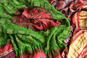 Shop beautiful light greena and peach bandhej gajji silk dupatta online in USA with Ajrakh print. Choose from an exclusive collection of Indian designer suits, Anarakali dresses, palazzo suits, salwar suits, designer gowns, readymade dupatta, sharara suits from Pure Elegance Indian clothing store in USA.-closeup