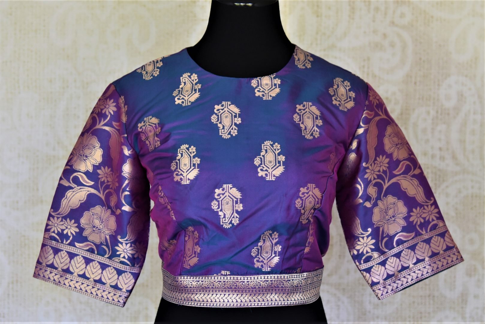 Shop gorgeous purple Banarasi silk saree blouse online in USA with zari buta. Elevate your handwoven sarees with this beautiful readymade saree blouses from Pure Elegance Indian clothing store in USA.-front