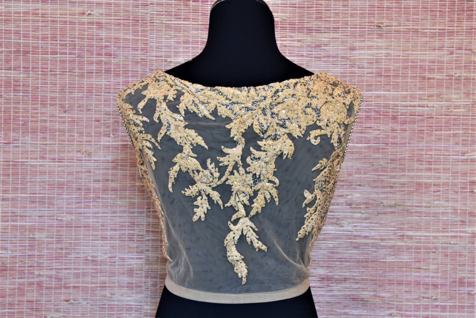 Shop beige embroidered net sleeveless saree blouse online in USA. Highlight your beautiful sarees with gorgeous designer sarees blouses, readymade saree blouses from Pure Elegance Indian clothing store in USA.-back