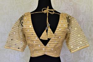 Shop stunning golden net sari blouse online in USA with mirror work. Elevate your handwoven sarees with this beautiful readymade saree blouses from Pure Elegance Indian clothing store in USA.-back