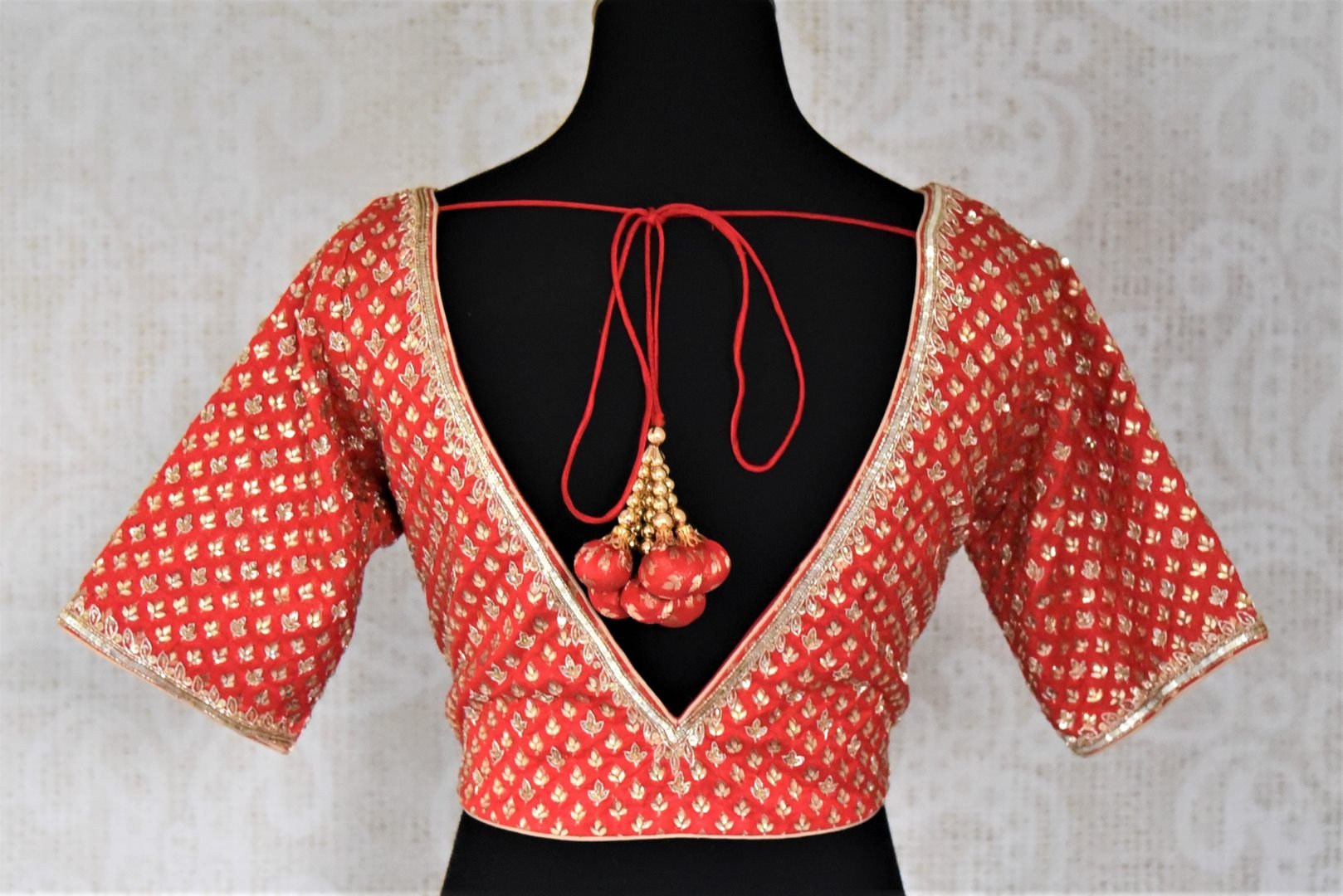 Shop red embroidered silk readymade saree blouse online in USA. Get spoiled for choices with a myriad of designer saree blouses, embroidered saree blouse from Pure Elegance Indian fashion store in USA.-back