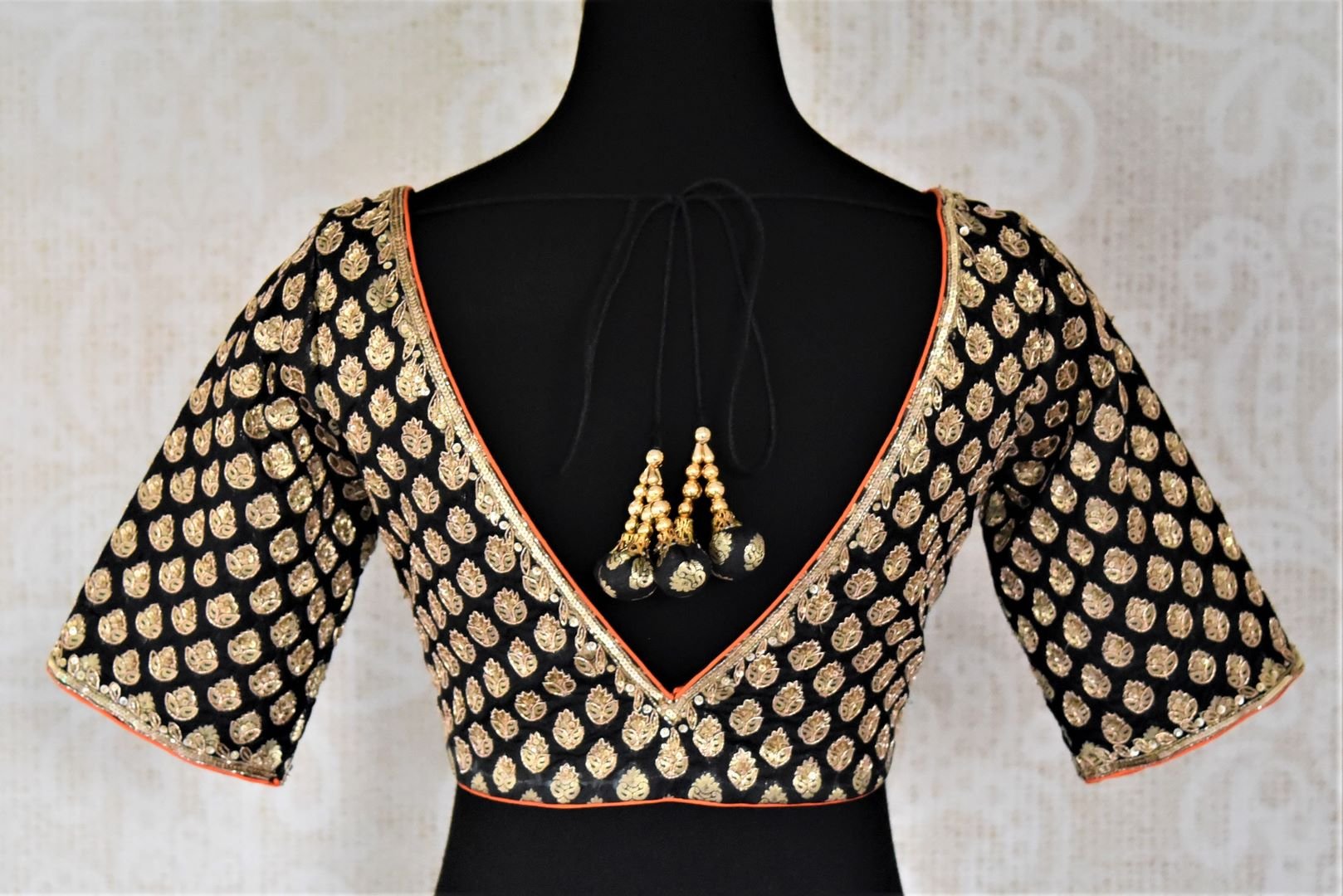 Shop black hand embroidered silk readymade sari blouse online in USA. Get spoiled for choices with a myriad of designer saree blouses, embroidered saree blouse from Pure Elegance Indian fashion store in USA.-back