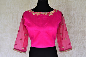 Shop stunning bright pink applique work silk saree blouse online in USA. Complete your beautiful Indian saris with designer saree blouses ,readymade saree blouse, cotton blouses, silk sari blouses from Pure Elegance Indian saree store in USA.-front