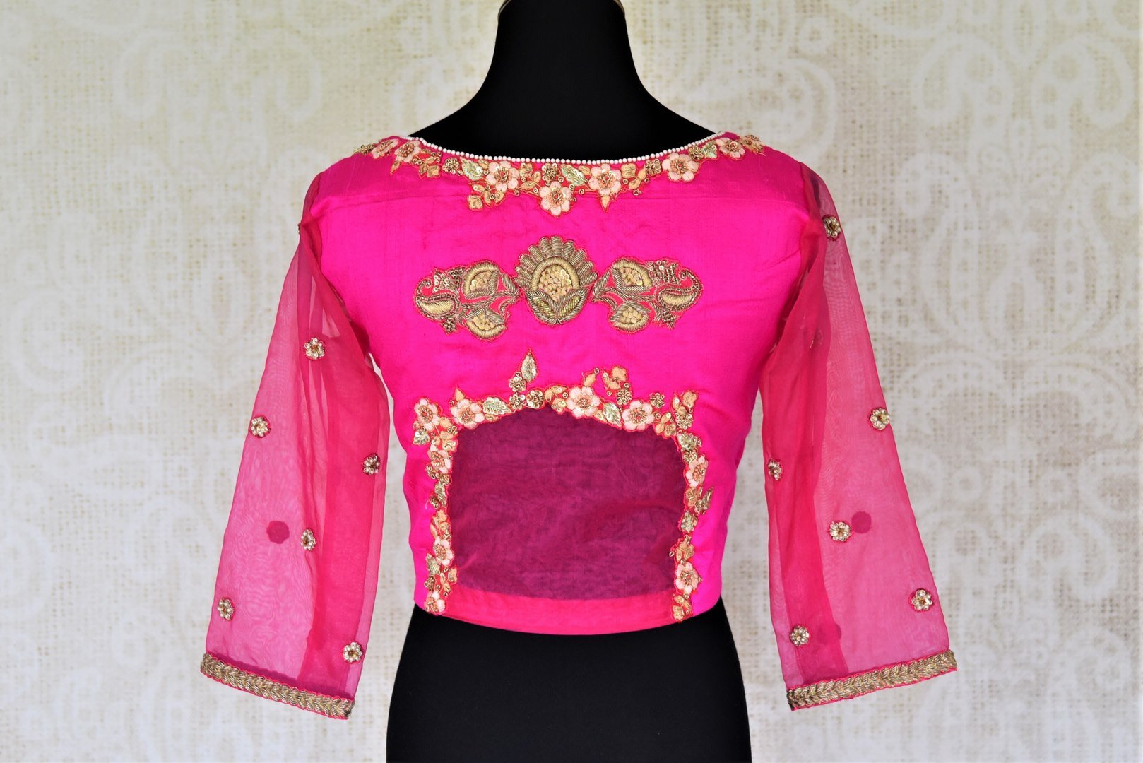 Shop stunning bright pink applique work silk saree blouse online in USA. Complete your beautiful Indian saris with designer saree blouses ,readymade saree blouse, cotton blouses, silk sari blouses from Pure Elegance Indian saree store in USA.- back