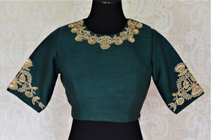 Shop stunning dark green hand embroidered silk saree blouse online in USA. Complete your beautiful Indian saris with designer saree blouses ,readymade saree blouse, cotton blouses, silk sari blouses from Pure Elegance Indian saree store in USA.-front