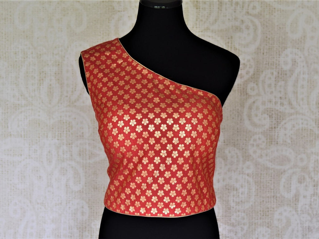 Shop stunning red one shoulder Banarasi saree blouse online in USA. Complete your beautiful Indian saris with designer saree blouses ,readymade saree blouse, cotton blouses, silk sari blouses from Pure Elegance Indian saree store in USA.-front