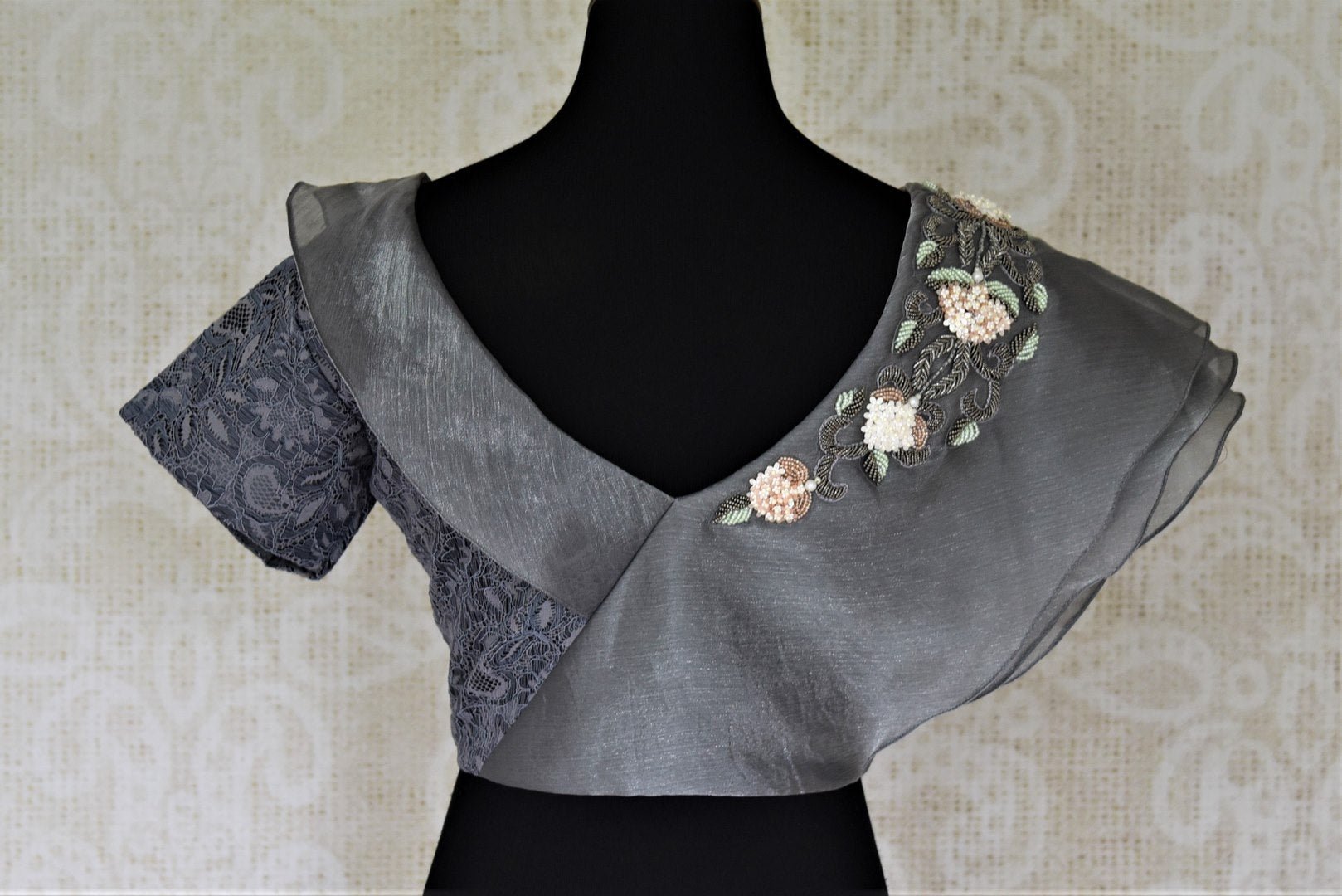 Buy stunning grey lace and tissue designer saree blouse online in USA. Complete your beautiful Indian saris with designer saree blouses ,readymade saree blouse, cotton blouses, silk sari blouses from Pure Elegance Indian saree store in USA.-back
