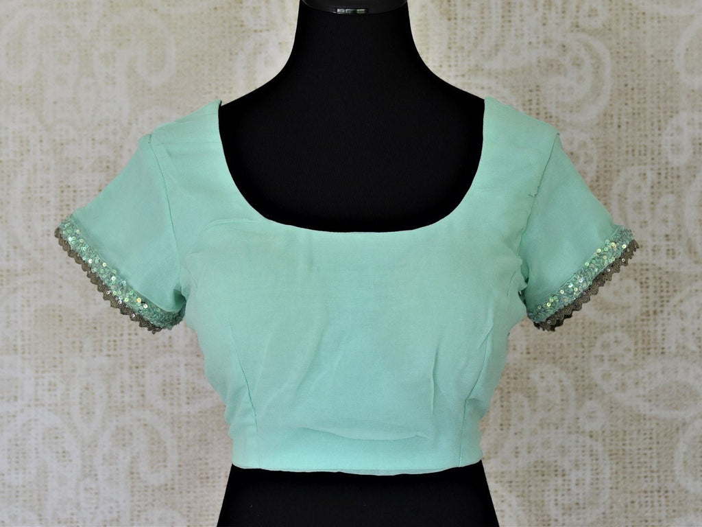 Shop stunning maroon embroidered designer saree blouse online in USA. Elevate your Indian saree style with exquisite readymade saree blouses, embroidered saree blouses, Benarasi saree blouse, fancy saree blouse from Pure Elegance Indian clothing store in USA.-front