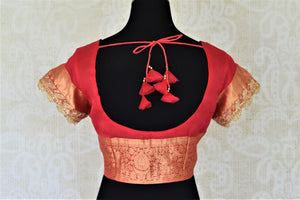 Buy stunning red organza saree blouse online in USA with embroidered border on sleeves. Complete your ethnic saree look with designer blouses, readymade sari blouse, embroidered saree blouse from Pure Elegance Indian saree store in USA.-back