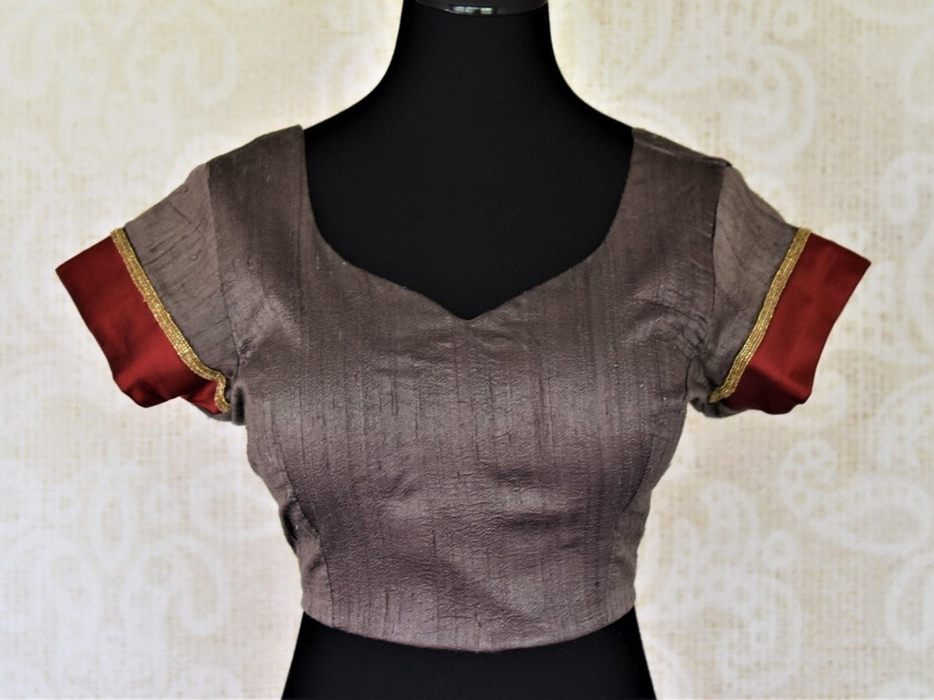 Shop dark grey silk sari saree blouse online in USA with red border on sleeves. Complete your ethnic saree look with designer blouses, readymade sari blouse, embroidered saree blouse from Pure Elegance Indian saree store in USA.-full view