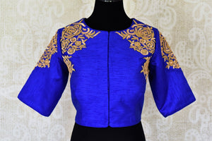 Shop gorgeous bright blue embroidered silk saree blouse online in USA. Complete your ethnic sarees with stunning designer saree blouse, readymade sari blouse, embroidered saree blouse in USA from Pure Elegance Indian fashion store in USA.-front