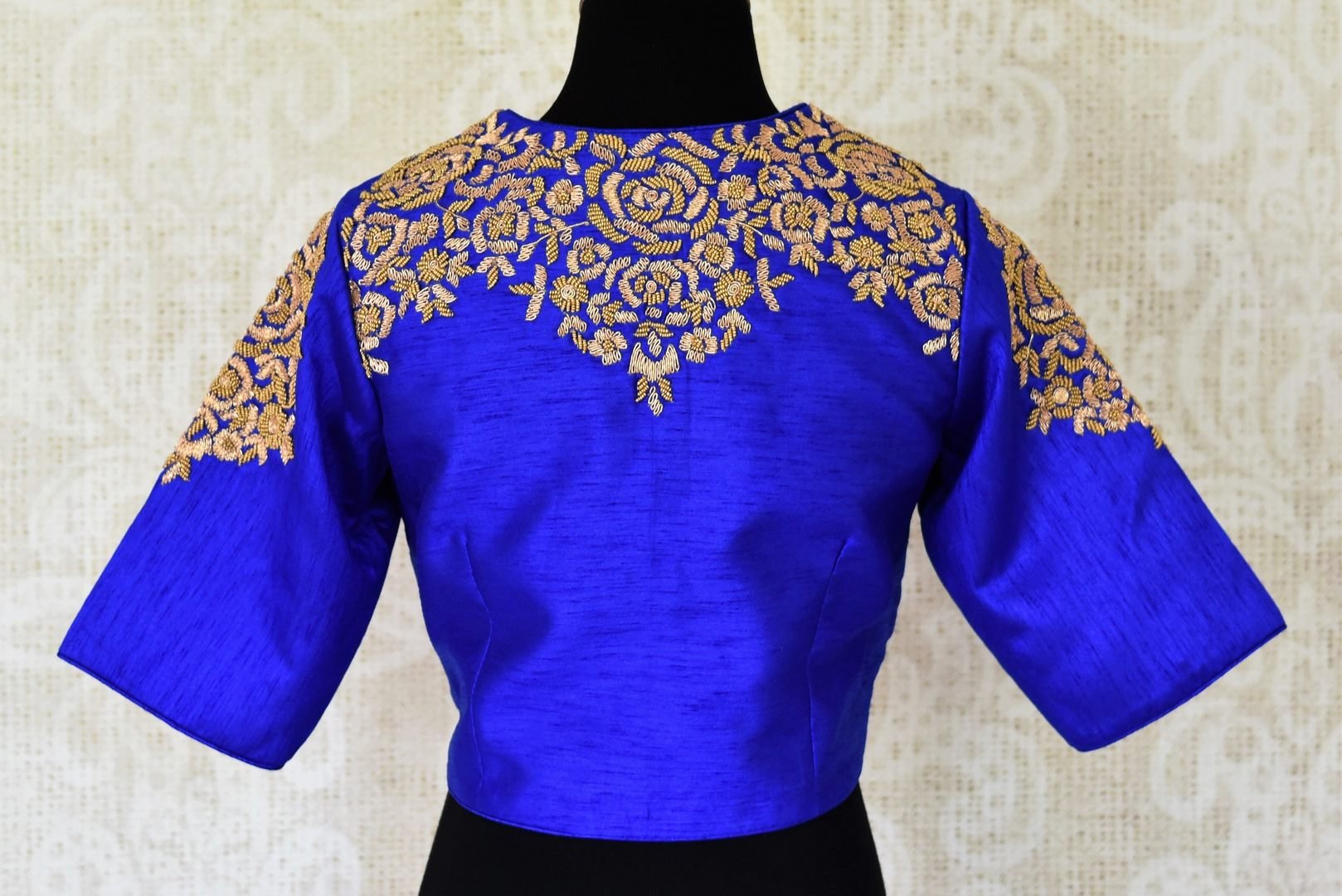Shop gorgeous bright blue embroidered silk saree blouse online in USA. Complete your ethnic sarees with stunning designer saree blouse, readymade sari blouse, embroidered saree blouse in USA from Pure Elegance Indian fashion store in USA.-back