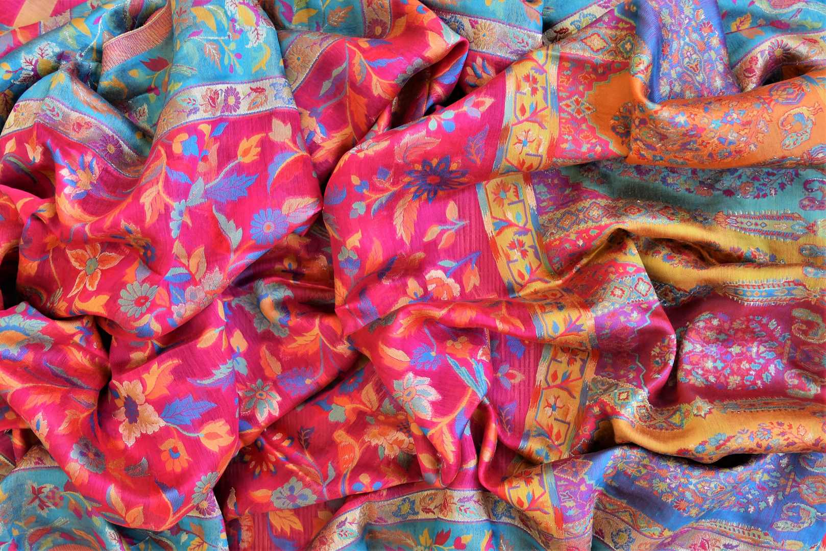 Shop stunning bright pink Kani dupatta online in USA with blue border. Add an elegant touch to your ethnic suits with Banarasi dupatta, leheriya dupatta, bandhej dupatta, silk dupattas, cotton dupattas from Pure Elegance Indian fashion store in USA.-closeup