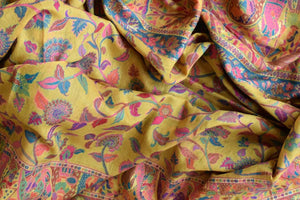 Shop stunning yellow Kani dupatta online in USA with multicolor border. Add an elegant touch to your ethnic suits with Banarasi dupatta, leheriya dupatta, bandhej dupatta, silk dupattas, cotton dupattas from Pure Elegance Indian fashion store in USA.-details