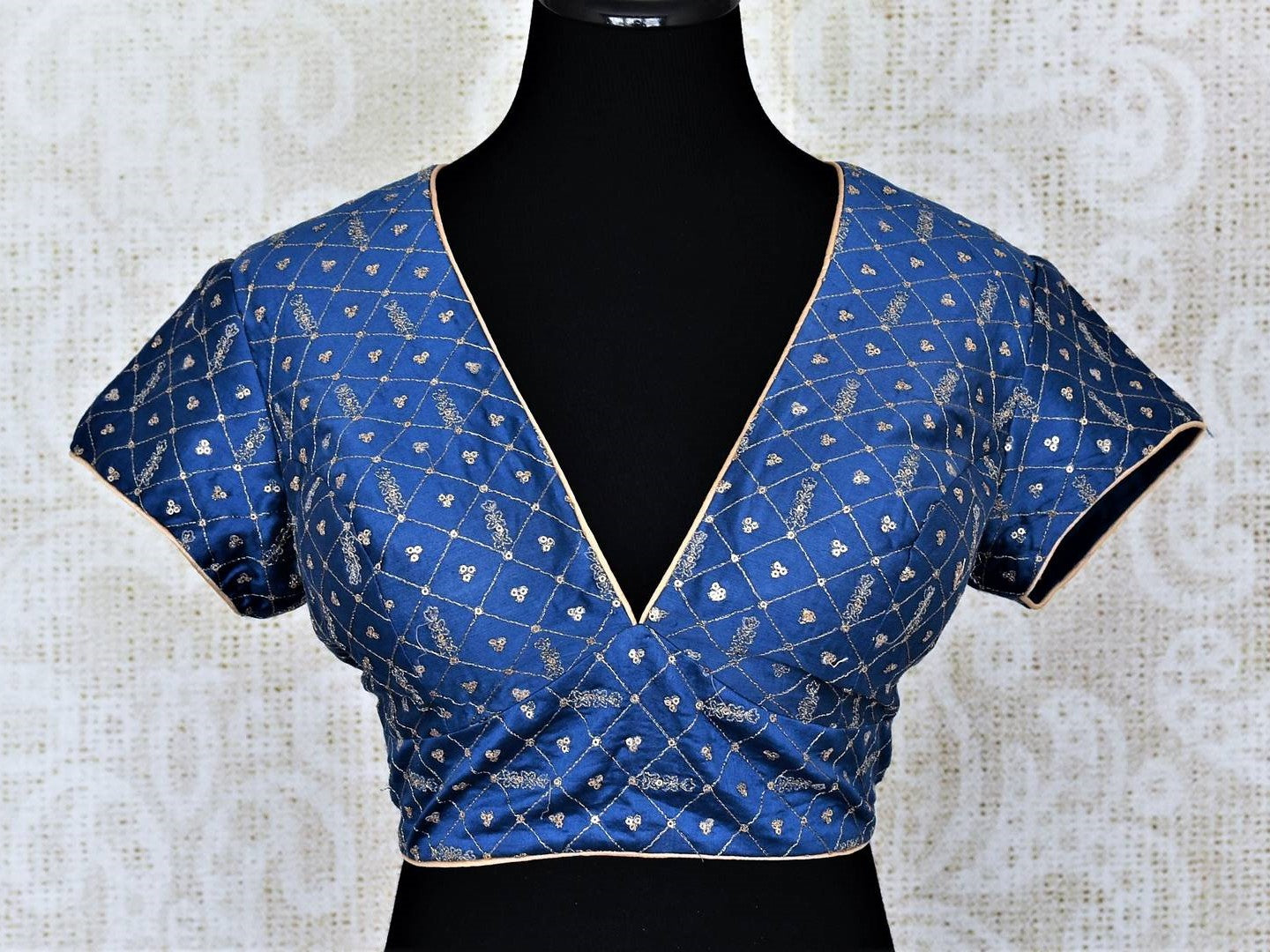 Shop beautiful blue embroidered silk saree blouse online in USA. Add an elegant touch to your ethnic sarees with beautiful designer blouses, readymade saree blouses, Banarasi blouses, choli-cut blouses from Pure Elegance Indian fashion store in USA.-front