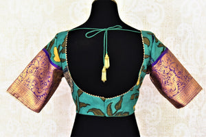 Buy beautiful sea green Kalamkari silk saree blouse online in USA with Banarasi sleeves. Go for a perfect saree style with latest designer saree blouses, pure silk blouse, choli-cut saree blouses, readymade sarees blouse, padded saree blouses from Pure Elegance Indian saree store in USA.-back