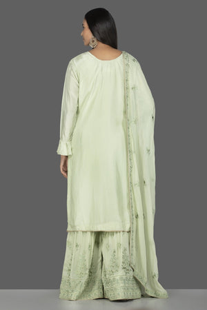Buy elegant mint green embroidered suit with palazzo online in USA with matching dupatta. Flaunt ethnic fashion on weddings and festive occasions with latest designer lehengas, Indian dresses, traditional Anarkali suits from Pure Elegance Indian clothing store in USA.-back