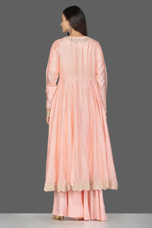 Buy gorgeous baby pink embroidered and layered kurta with palazzo online in USA. Flaunt ethnic fashion on weddings and festive occasions with latest designer lehengas, Indian dresses, traditional Anarkali suits from Pure Elegance Indian clothing store in USA.-back