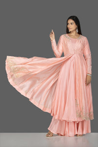 Buy gorgeous baby pink embroidered and layered kurta with palazzo online in USA. Flaunt ethnic fashion on weddings and festive occasions with latest designer lehengas, Indian dresses, traditional Anarkali suits from Pure Elegance Indian clothing store in USA.-full view