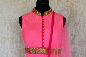 Buy pink embroidered net sleeveless Anarkali suit online in USA with dupatta from Pure Elegance. Choose from a range of exclusive Indian designer suits, wedding dresses, Anarkali suits in beautiful styles and designs from our Indian fashion store in USA and flaunt your tasteful sartorial choices on special occasions.-front