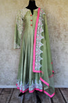 Buy pista green embroidered silk Anarkali suit online in USA with dupatta from Pure Elegance. Choose from a range of exclusive Indian designer suits, wedding dresses, Anarkali suits in beautiful styles and designs from our Indian fashion store in USA and flaunt your tasteful sartorial choices on special occasions.-full view