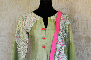 Buy pista green embroidered silk Anarkali suit online in USA with dupatta from Pure Elegance. Choose from a range of exclusive Indian designer suits, wedding dresses, Anarkali suits in beautiful styles and designs from our Indian fashion store in USA and flaunt your tasteful sartorial choices on special occasions.-front