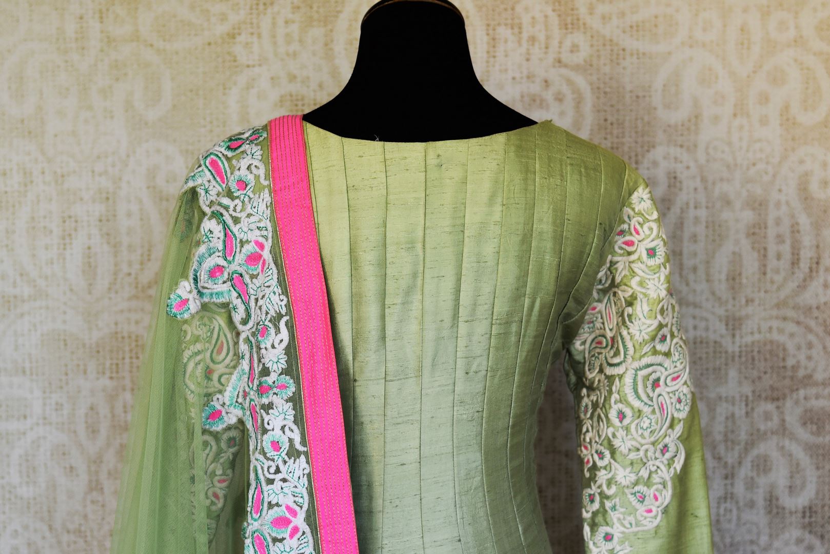 Buy pista green embroidered silk Anarkali suit online in USA with dupatta from Pure Elegance. Choose from a range of exclusive Indian designer suits, wedding dresses, Anarkali suits in beautiful styles and designs from our Indian fashion store in USA and flaunt your tasteful sartorial choices on special occasions.-back