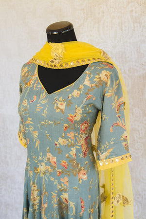 501067-suit-3/4-lenght-sleeve-light-blue-floral-print-gold-yellow-accent-top-view